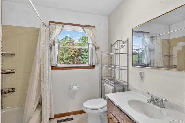 a view of a livingroom with a window