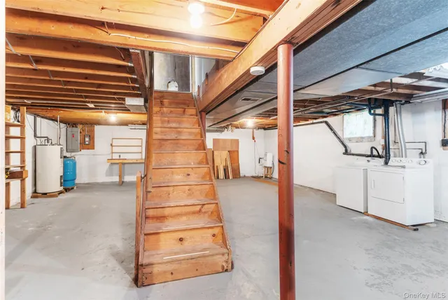 a view of an empty room with stairs