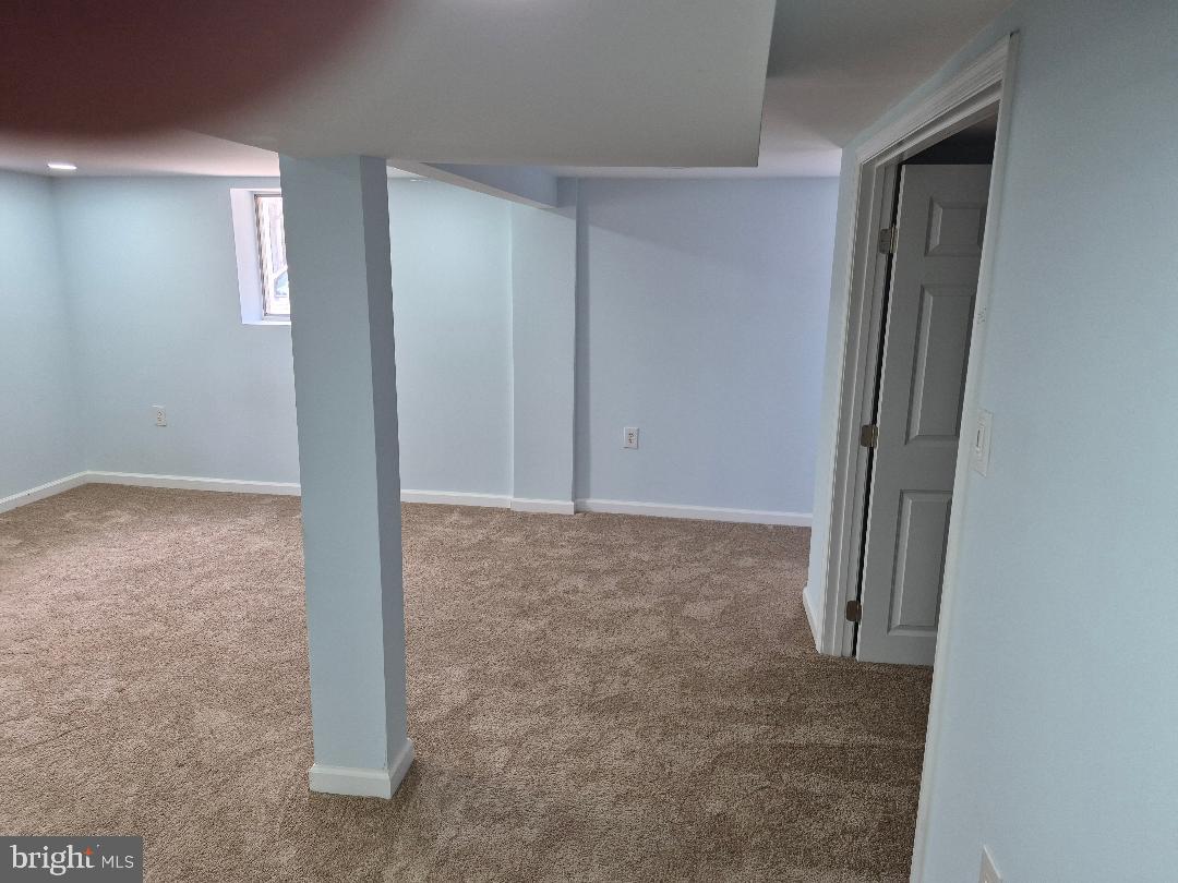 4812 Topping Road Rockville, MD 20852 - Photo 23 of 37 an empty room with windows