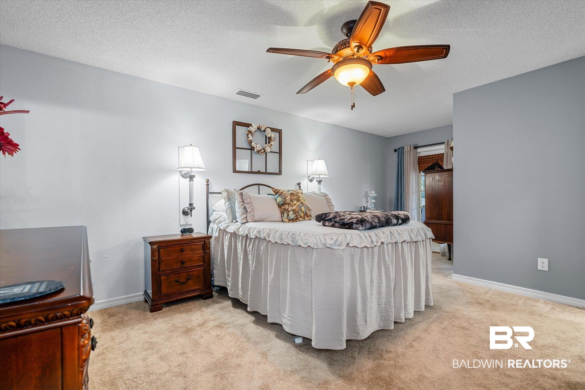 356 Collinwood Loop Foley, AL 36535 - Photo 12 of 21 Carpeted bedroom featuring ceiling fan and a textured ceiling