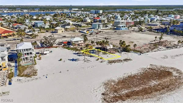 an aerial view of beach with ocean view