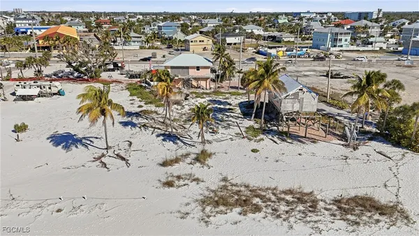 an aerial view of beach and ocean