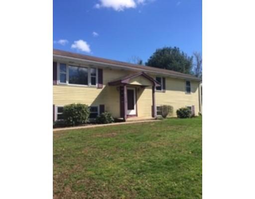 42 Harrisville Road Putnam, CT 06260 - Photo 1 of 25 a front view of a house with garden