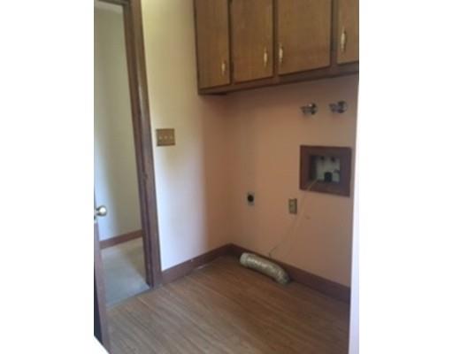 42 Harrisville Road Putnam, CT 06260 - Photo 14 of 25 a view of a room with wooden floor and cabinets