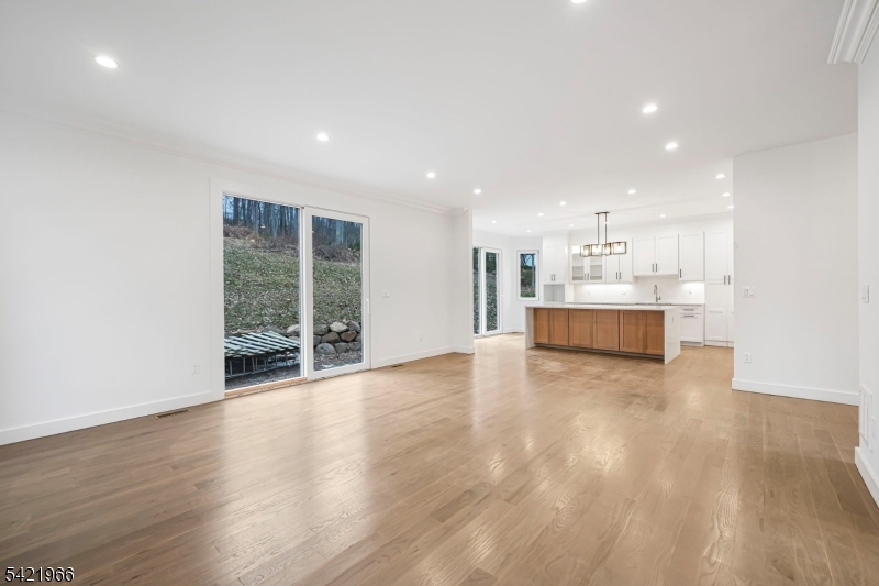85 Pine Brook Road Montville, NJ 07082 - Photo 17 of 50 a view of kitchen with wooden floor and windows