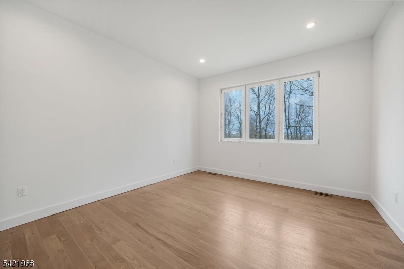 85 Pine Brook Road Montville, NJ 07082 - Photo 21 of 50 an empty room with a window