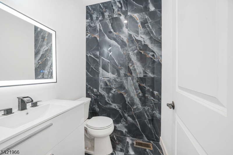 85 Pine Brook Road Montville, NJ 07082 - Photo 24 of 50 a bathroom with a sink toilet and shower