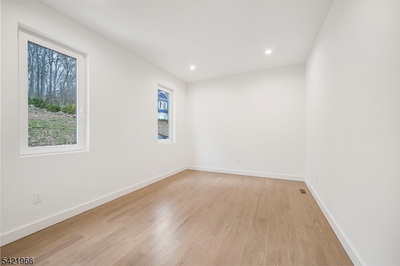 85 Pine Brook Road Montville, NJ 07082 - Photo 26 of 50 an empty room with a window
