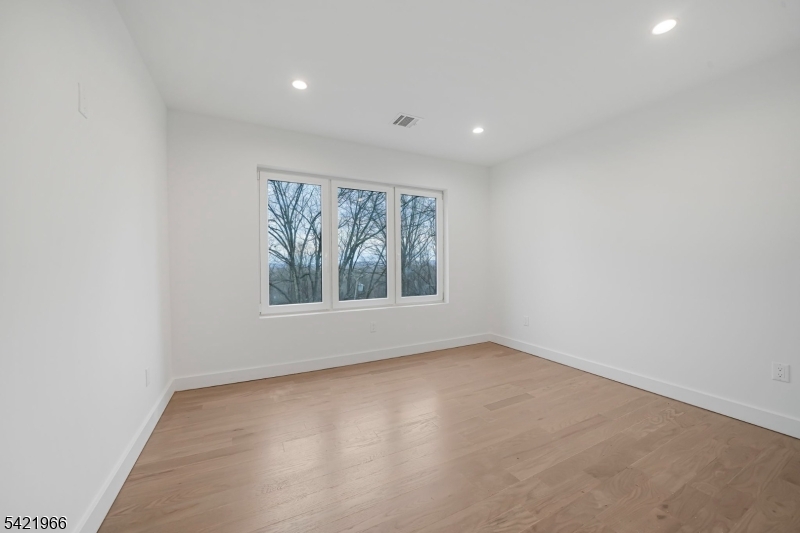 85 Pine Brook Road Montville, NJ 07082 - Photo 37 of 50 an empty room with a window