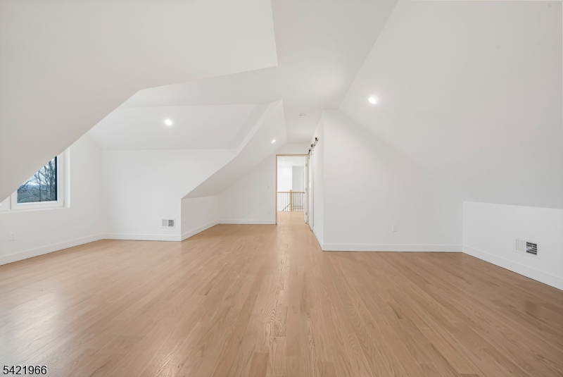 85 Pine Brook Road Montville, NJ 07082 - Photo 40 of 50 a view of empty room with wooden floor