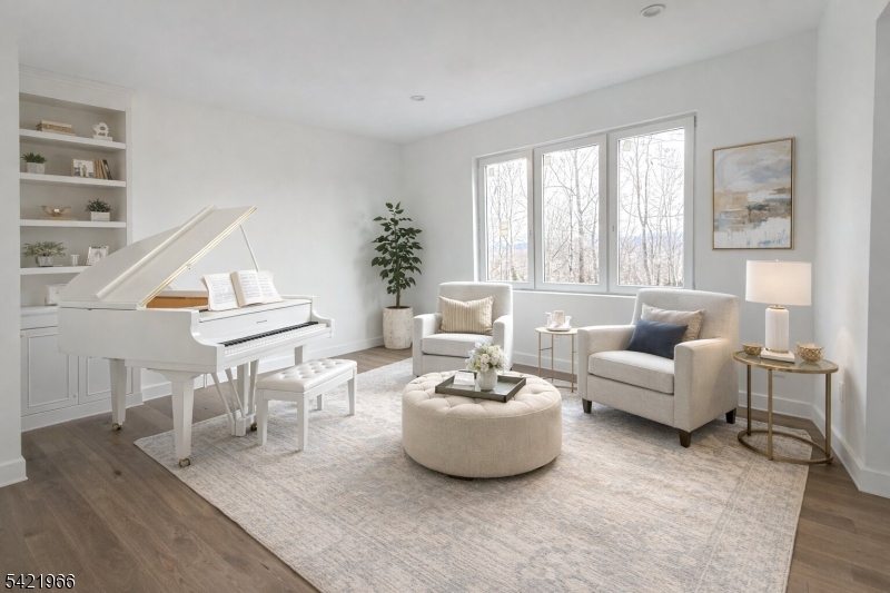 85 Pine Brook Road Montville, NJ 07082 - Photo 8 of 50 a living room with furniture and a large window