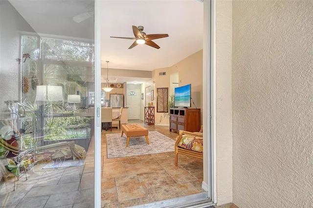 a kitchen with granite countertop cabinets stainless steel appliances and a counter space