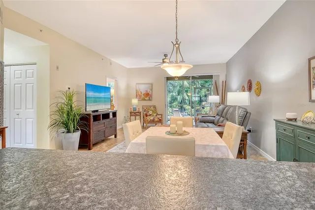 a view of swimming pool from a room with yard