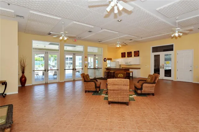 an aerial view of a house with a yard and swimming pool