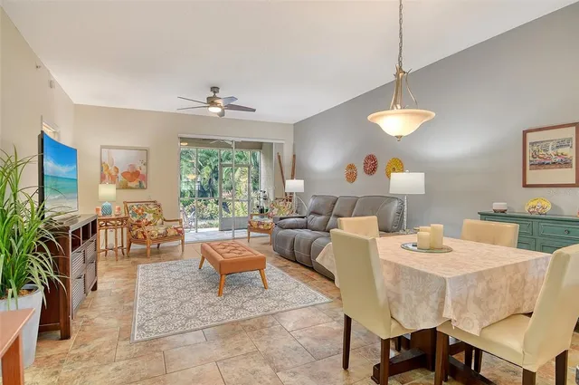 a room with furniture and a large window