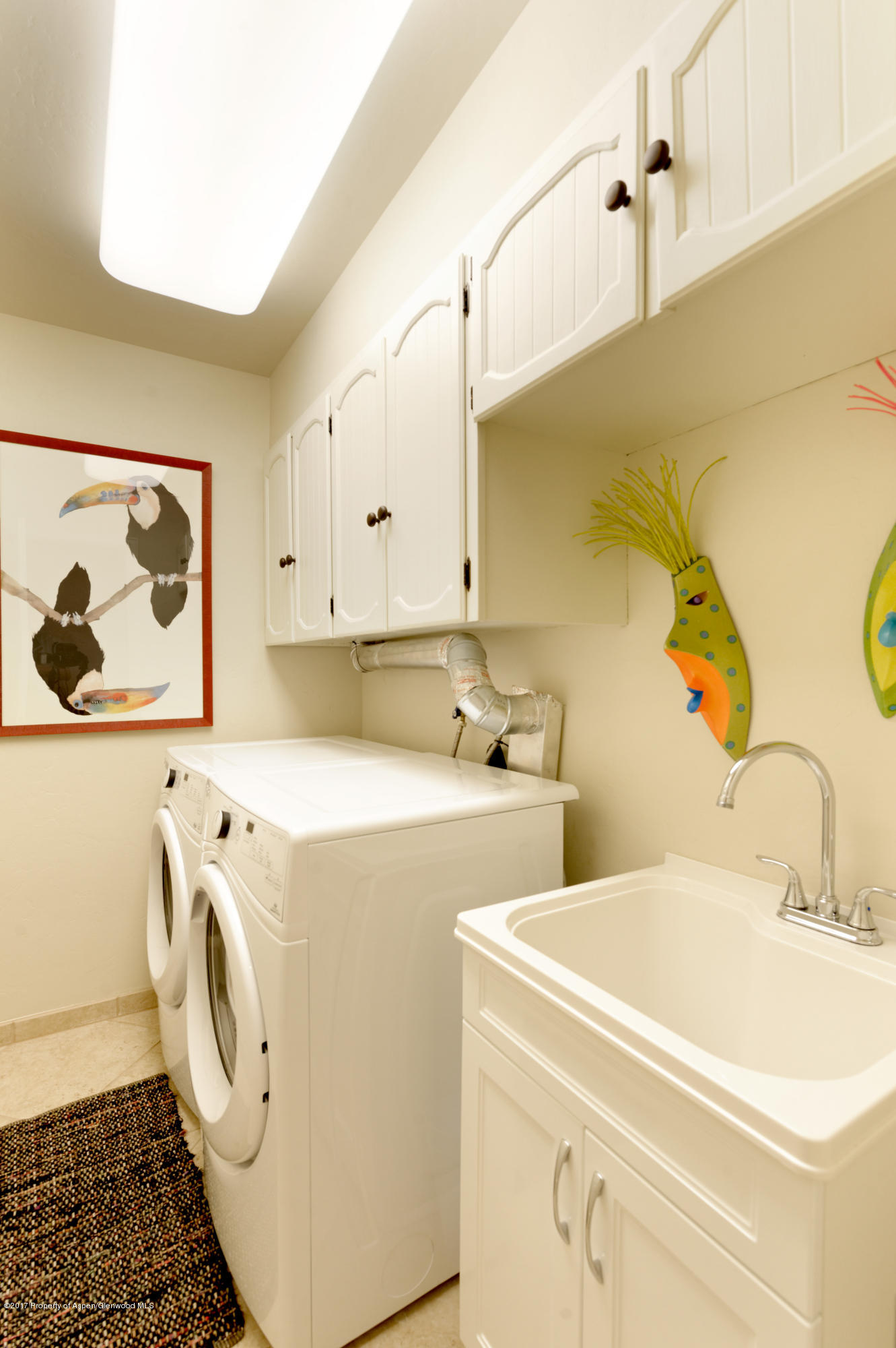 49 Elk Ridge Lane Snowmass Village, CO 81615 - Photo 21 of 24 a utility room with dryer and washer