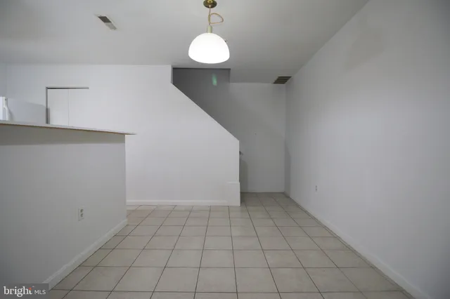 a view of a kitchen with a sink cabinets and a window