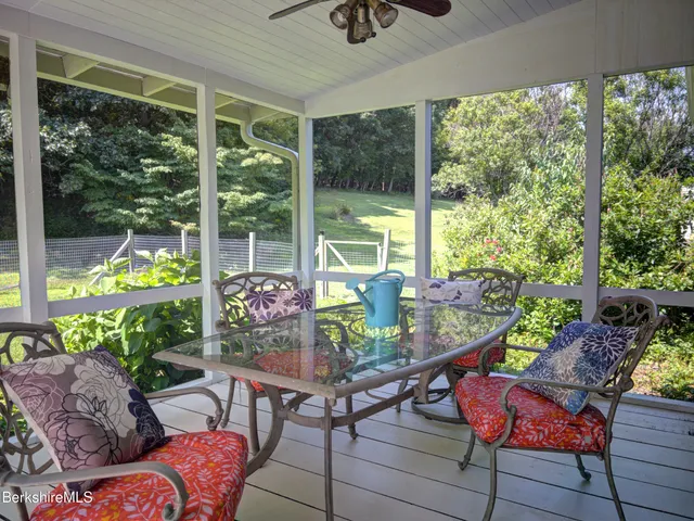a outdoor living space with furniture and garden view