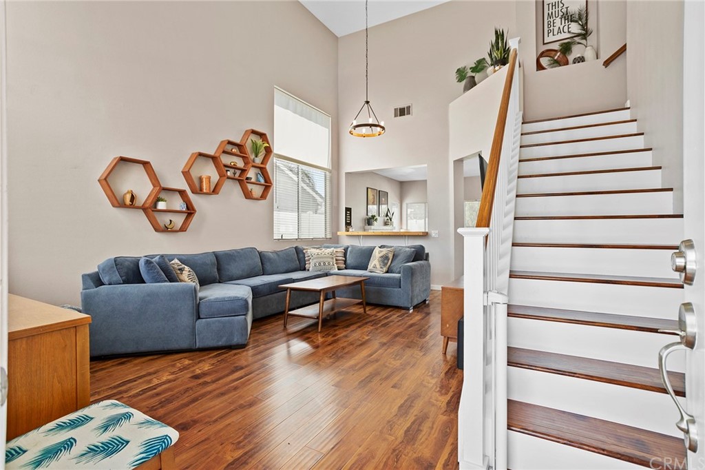 32289 Cercle Beauregard Temecula, CA 92591 - Photo 14 of 45 a living room with furniture and wooden floor