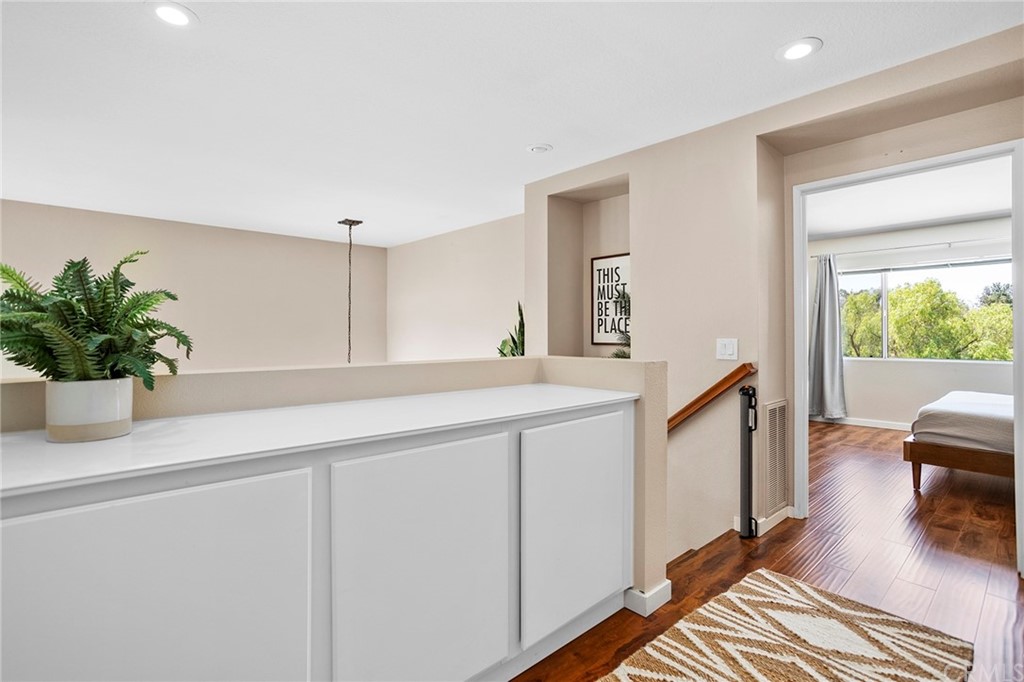 32289 Cercle Beauregard Temecula, CA 92591 - Photo 15 of 45 a bathroom with a sink a mirror and a potted plant