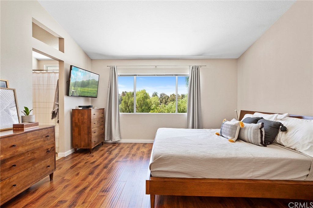 32289 Cercle Beauregard Temecula, CA 92591 - Photo 16 of 45 a bedroom with a bed and a flat screen tv