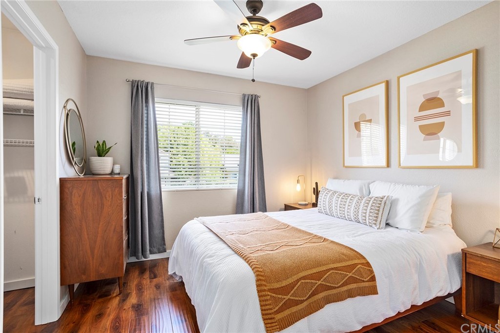 32289 Cercle Beauregard Temecula, CA 92591 - Photo 18 of 45 a bedroom with a large bed and a window