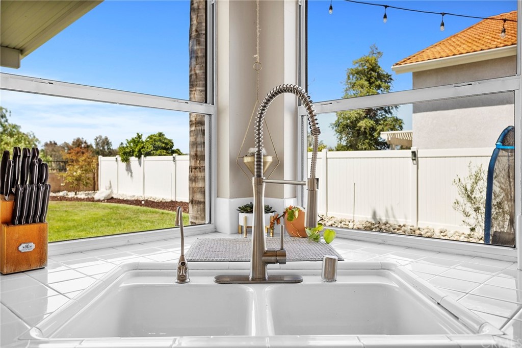 32289 Cercle Beauregard Temecula, CA 92591 - Photo 7 of 45 a view of a building with floor to ceiling windows