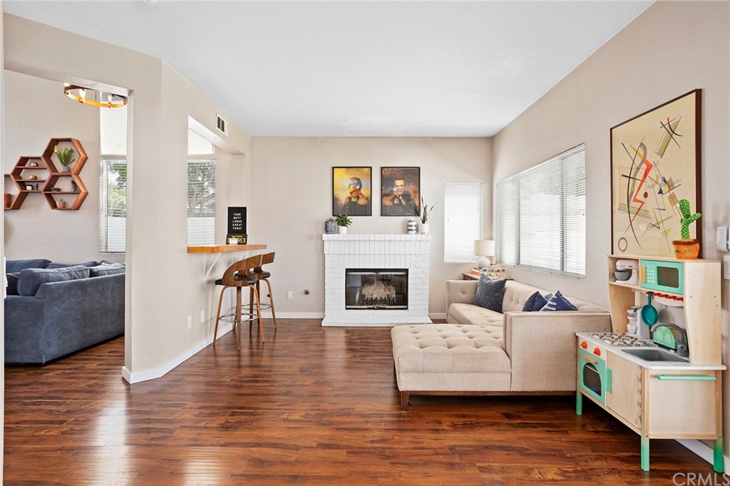 32289 Cercle Beauregard Temecula, CA 92591 - Photo 8 of 45 a living room with furniture and a fireplace