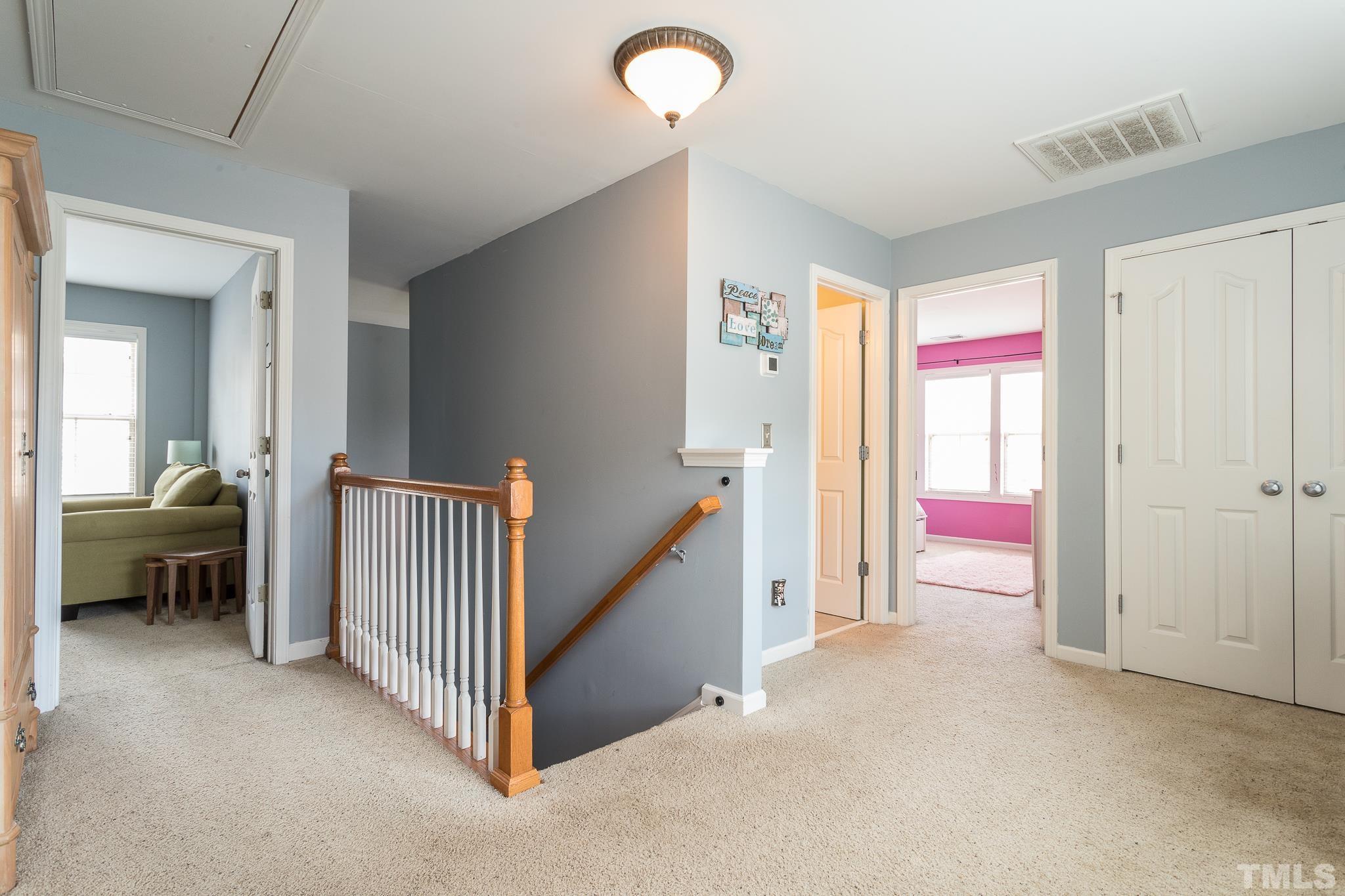 6221 Oconner Street Raleigh, NC 27617 - Photo 13 of 26 a view of a livingroom with a staircase