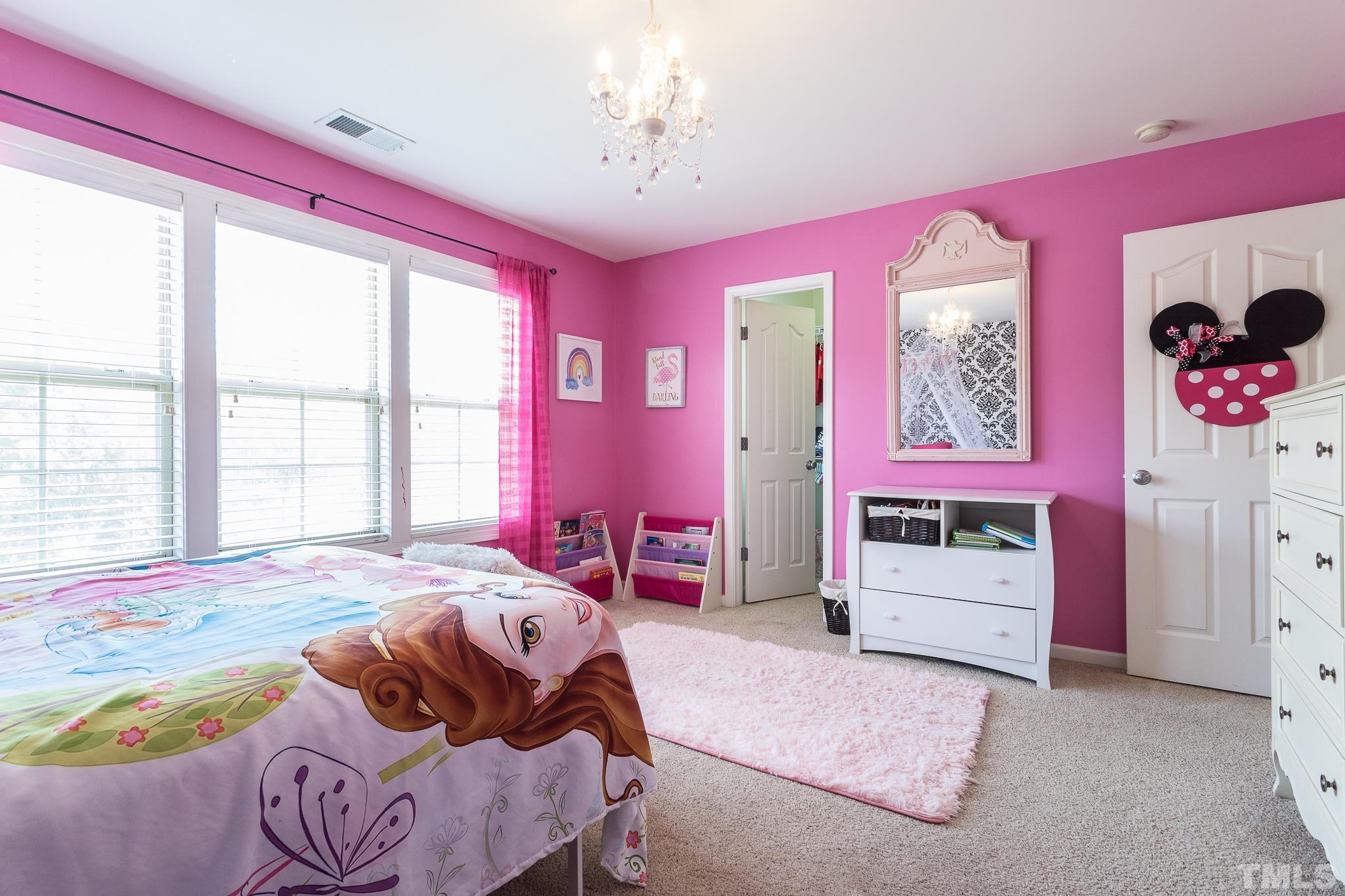 6221 Oconner Street Raleigh, NC 27617 - Photo 15 of 26 a bedroom with a bed and a window