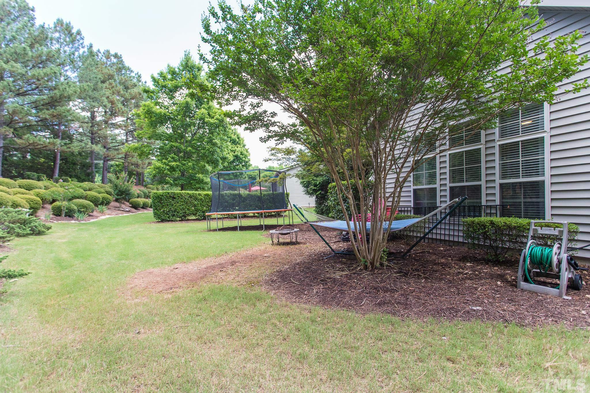 6221 Oconner Street Raleigh, NC 27617 - Photo 25 of 26 a view of a park with large trees