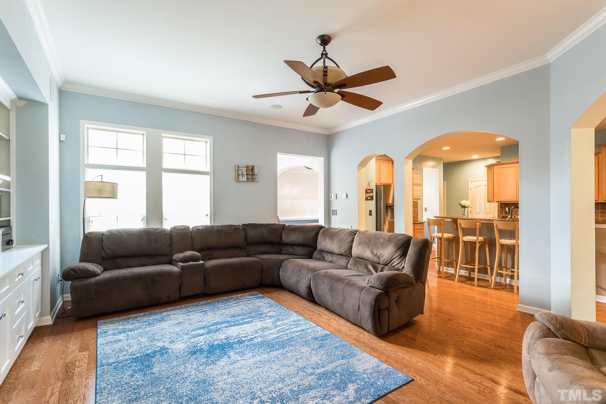 6221 Oconner Street Raleigh, NC 27617 - Photo 7 of 26 a living room with furniture and a large window