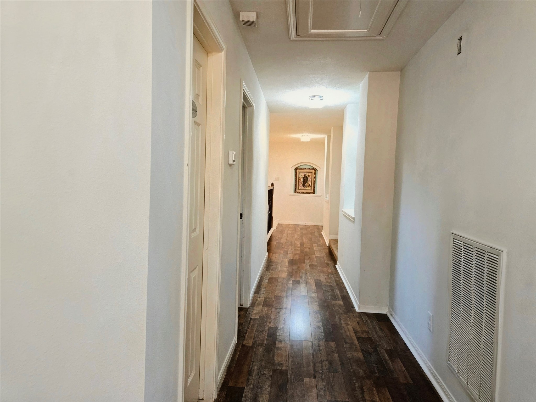 9211 Memorial Grove Drive Spring, TX 77379 - Photo 29 of 38 a view of a hallway with wooden floor
