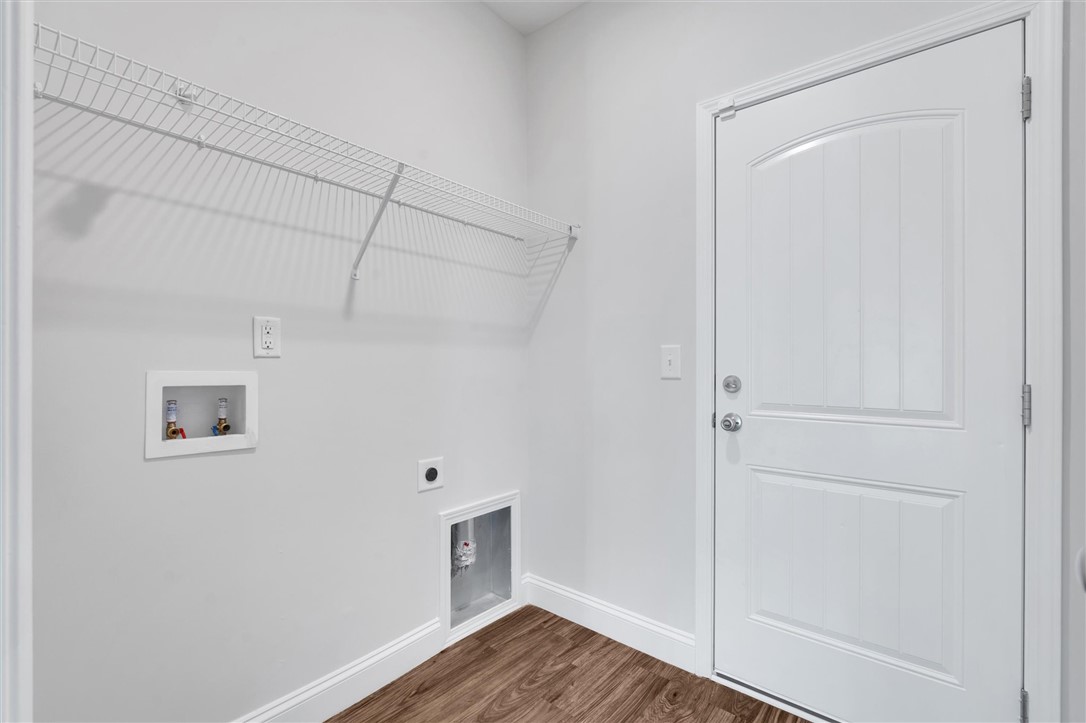 155 Norfolk Circle Anderson, SC 29625 - Photo 20 of 33 This functional laundry area features convenient hookups and practical overhead shelving.