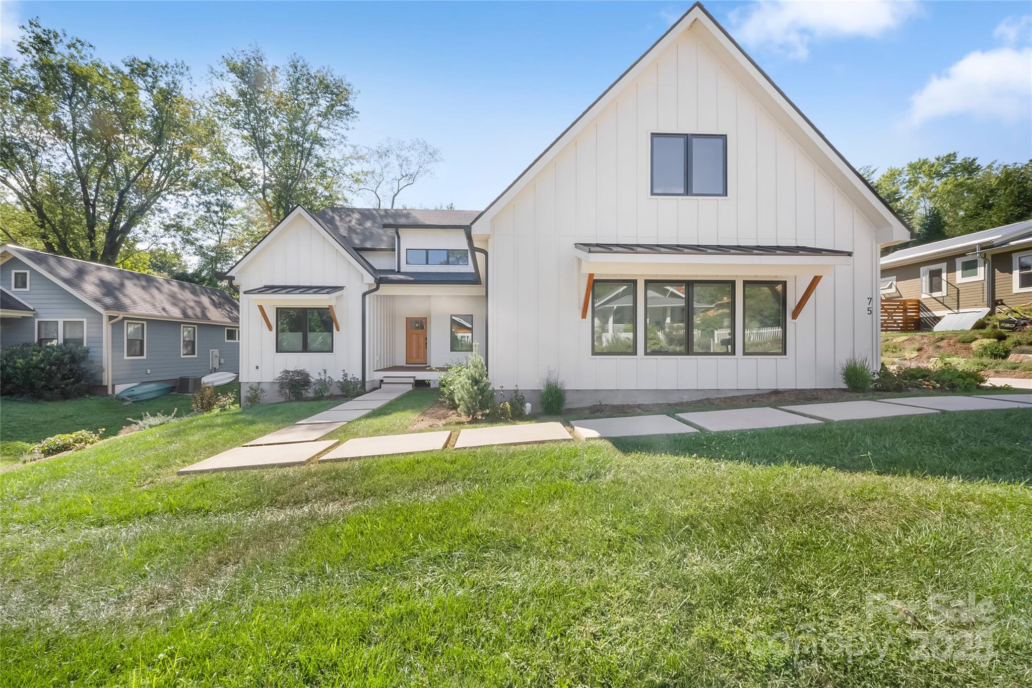 a view of a yard in front of a house