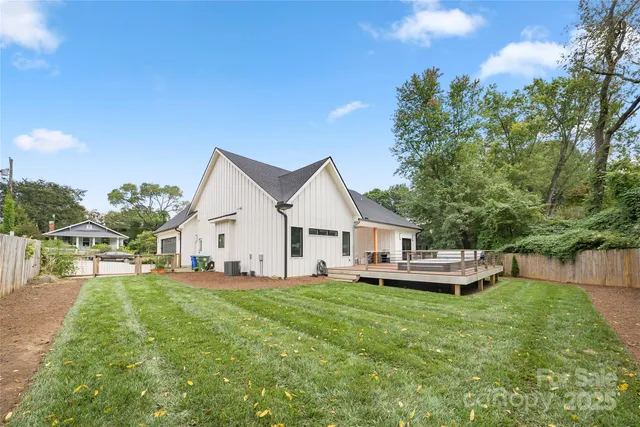 a view of a bench in the backyard