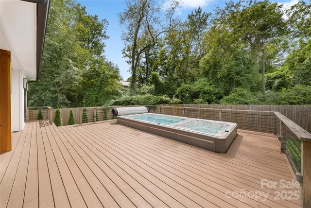a aerial view of a house with a yard