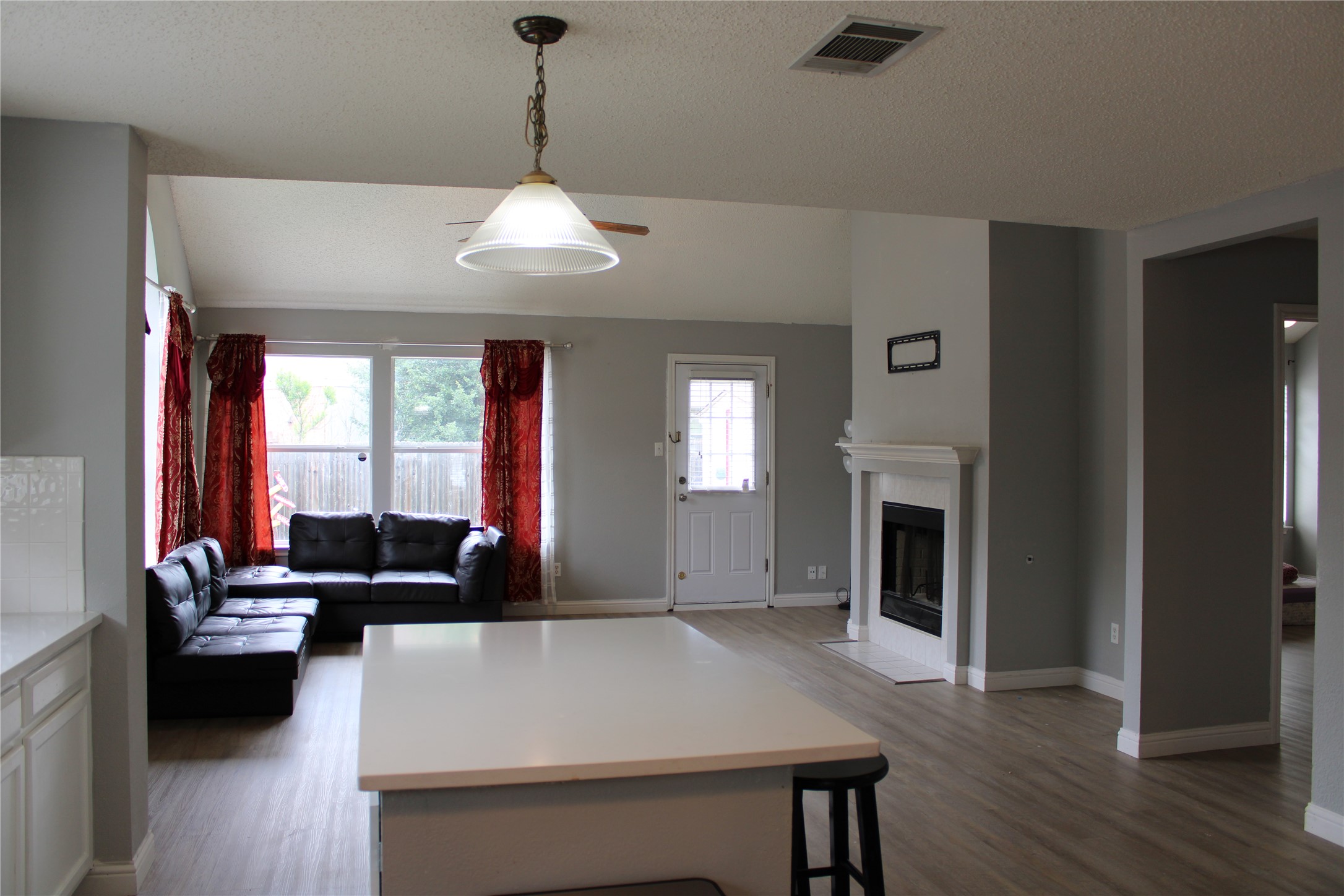 16205 Glorious Lane Pflugerville, TX 78660 - Photo 8 of 30 a living room with furniture fireplace and window