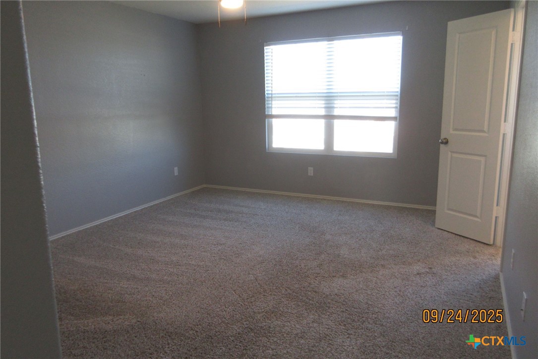 125 Greatest Gift Way Jarrell, TX 76537 - Photo 13 of 24 an empty room with a window