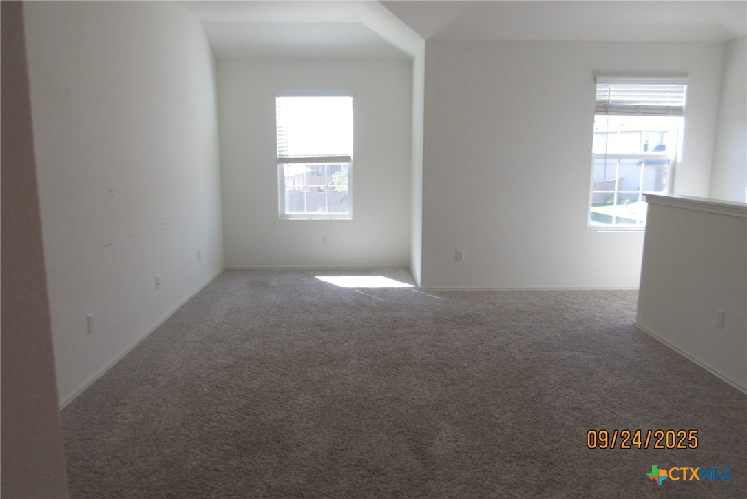 125 Greatest Gift Way Jarrell, TX 76537 - Photo 18 of 24 an empty room with windows