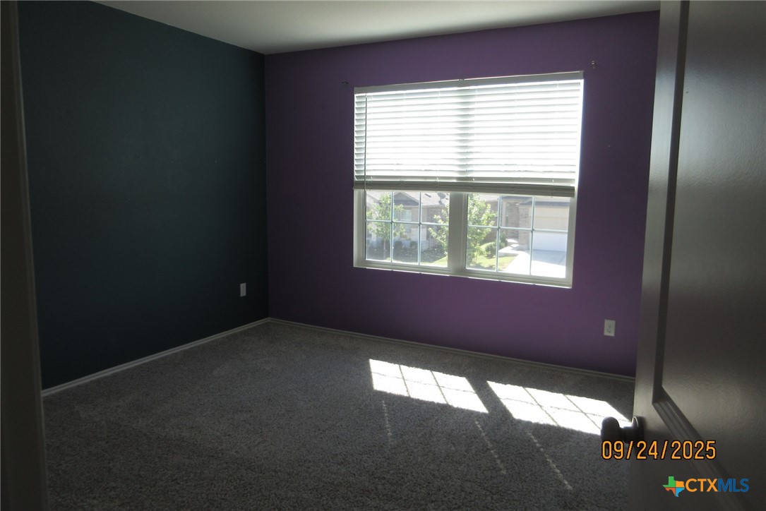 125 Greatest Gift Way Jarrell, TX 76537 - Photo 23 of 24 a view of an empty room with a window
