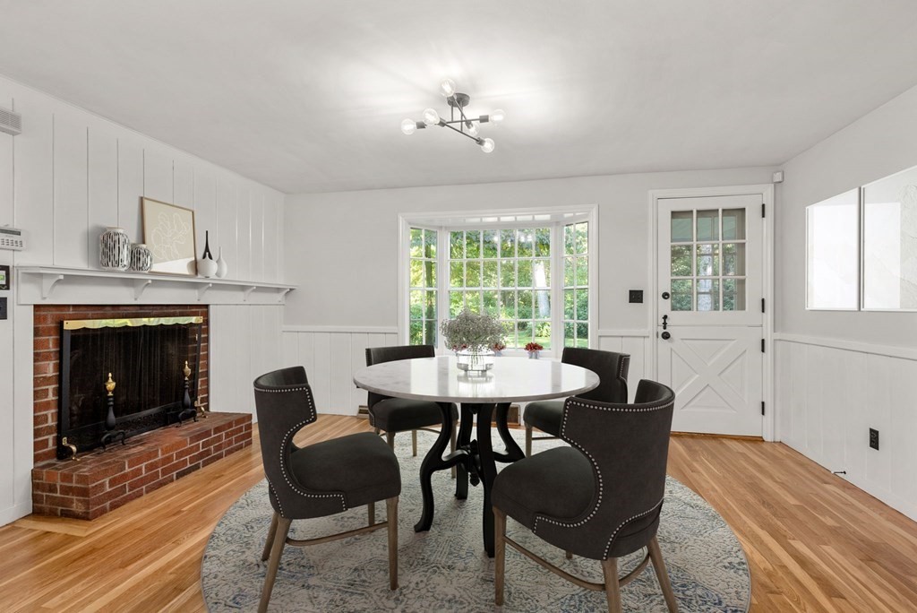 406 Chestnut Street Ashland, MA 01721 - Photo 5 of 28 a view of a dining room with furniture window and wooden floor
