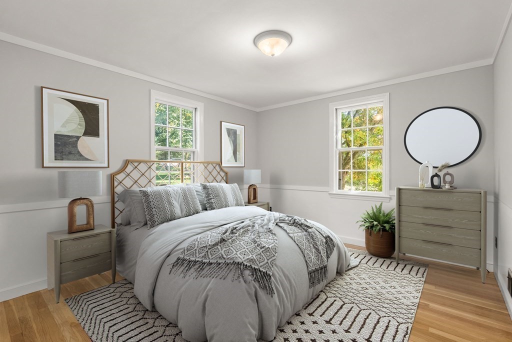 406 Chestnut Street Ashland, MA 01721 - Photo 9 of 28 a bedroom with a bed and a window