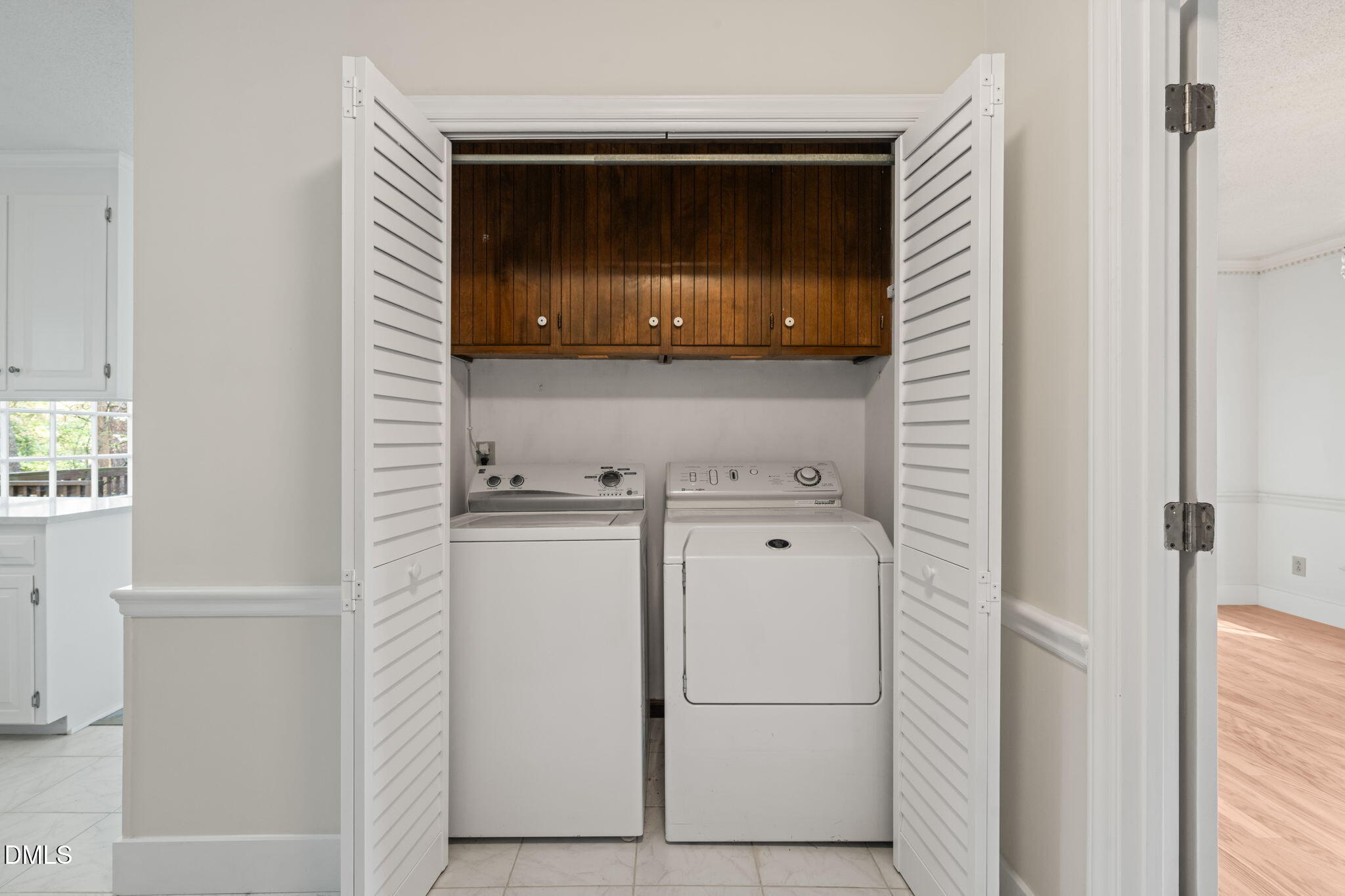 6115 Winthrop Drive Raleigh, NC 27612 - Photo 13 of 41 a utility room with dryer and washer