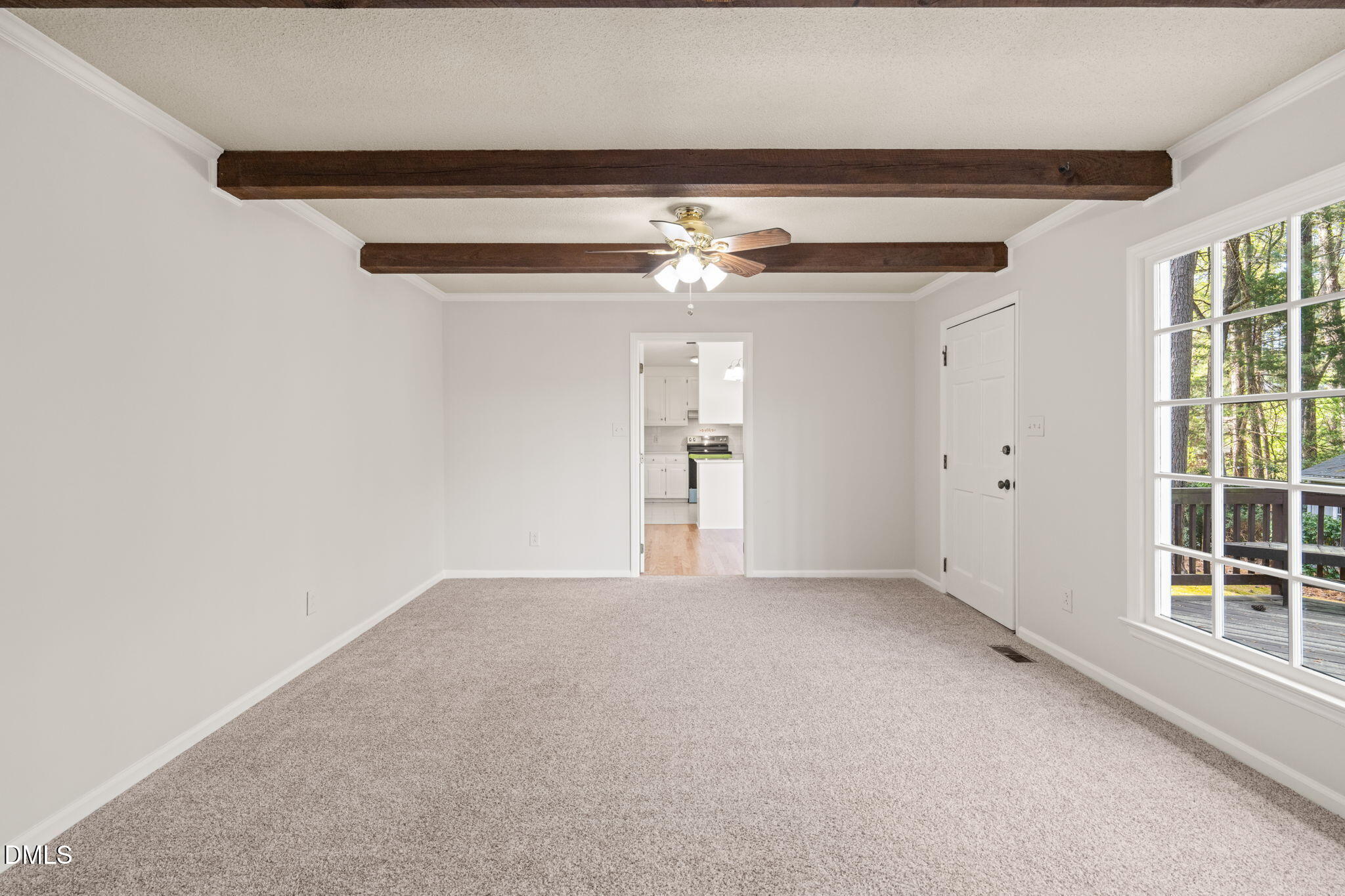 6115 Winthrop Drive Raleigh, NC 27612 - Photo 15 of 41 an empty room with windows and entrance