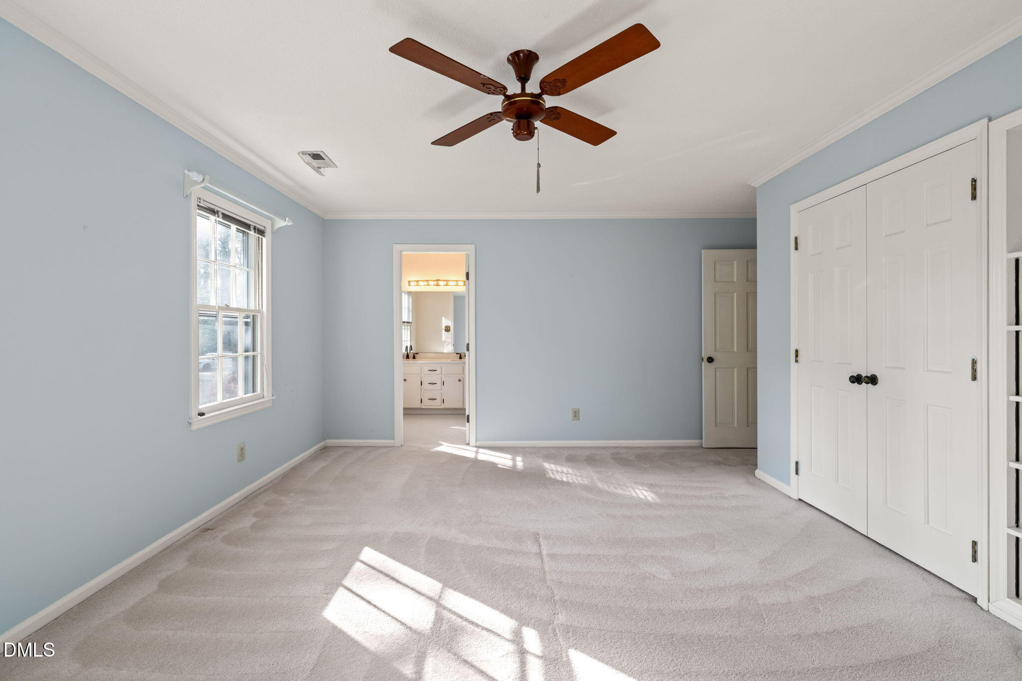 6115 Winthrop Drive Raleigh, NC 27612 - Photo 27 of 41 wooden floor in an empty room with a window