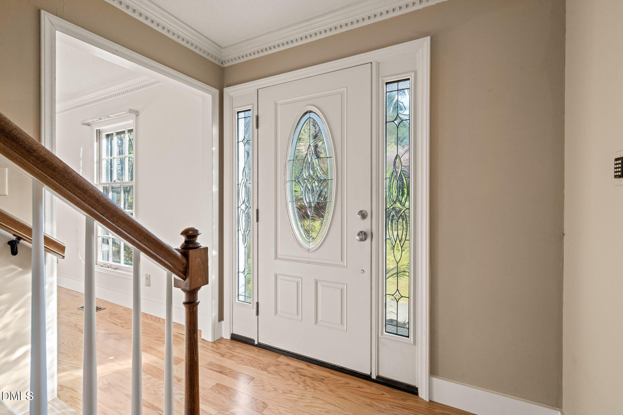 6115 Winthrop Drive Raleigh, NC 27612 - Photo 3 of 41 a view of an entryway with wooden floor