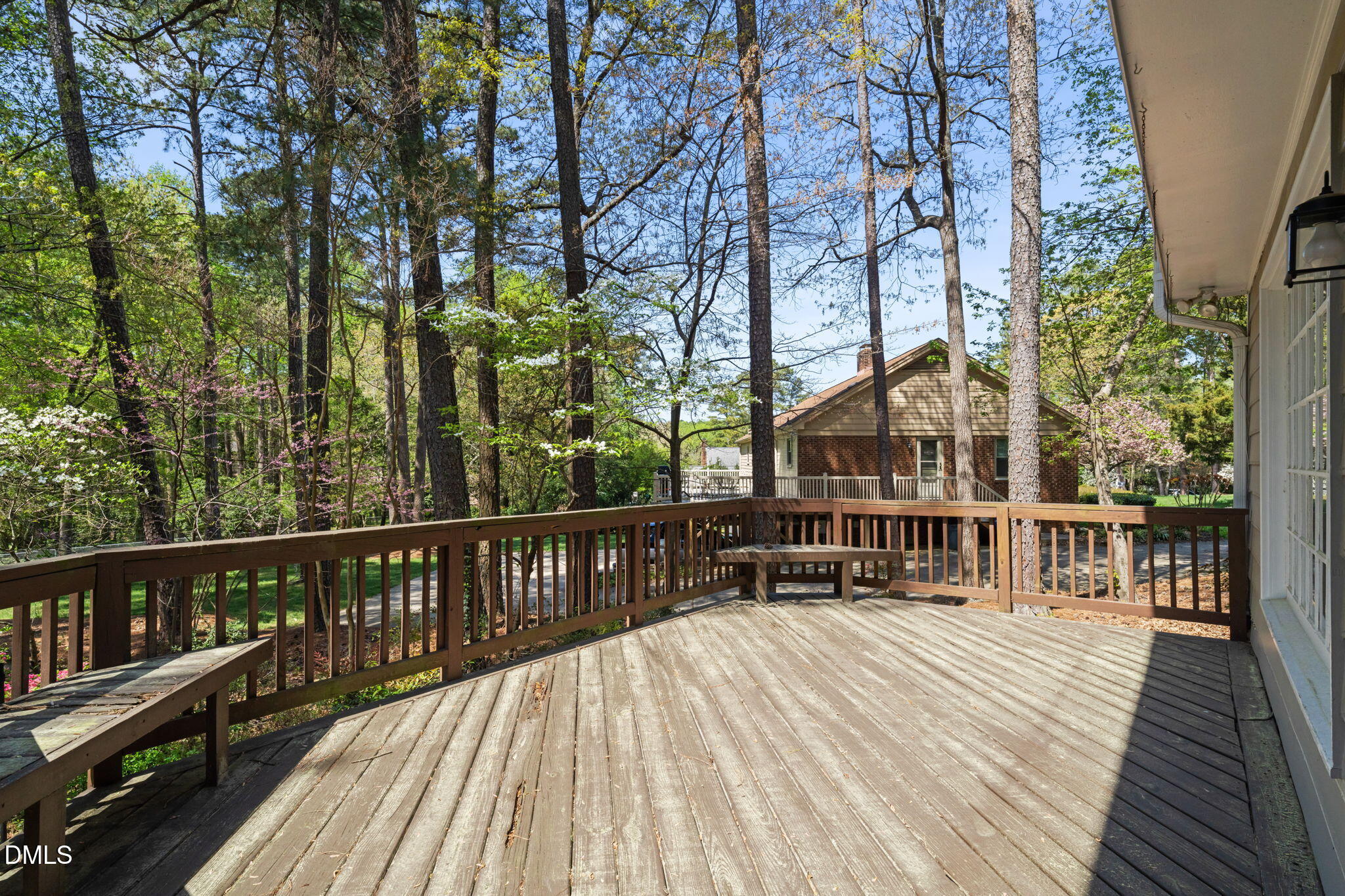 6115 Winthrop Drive Raleigh, NC 27612 - Photo 32 of 41 a view of a balcony with wooden floor and fence