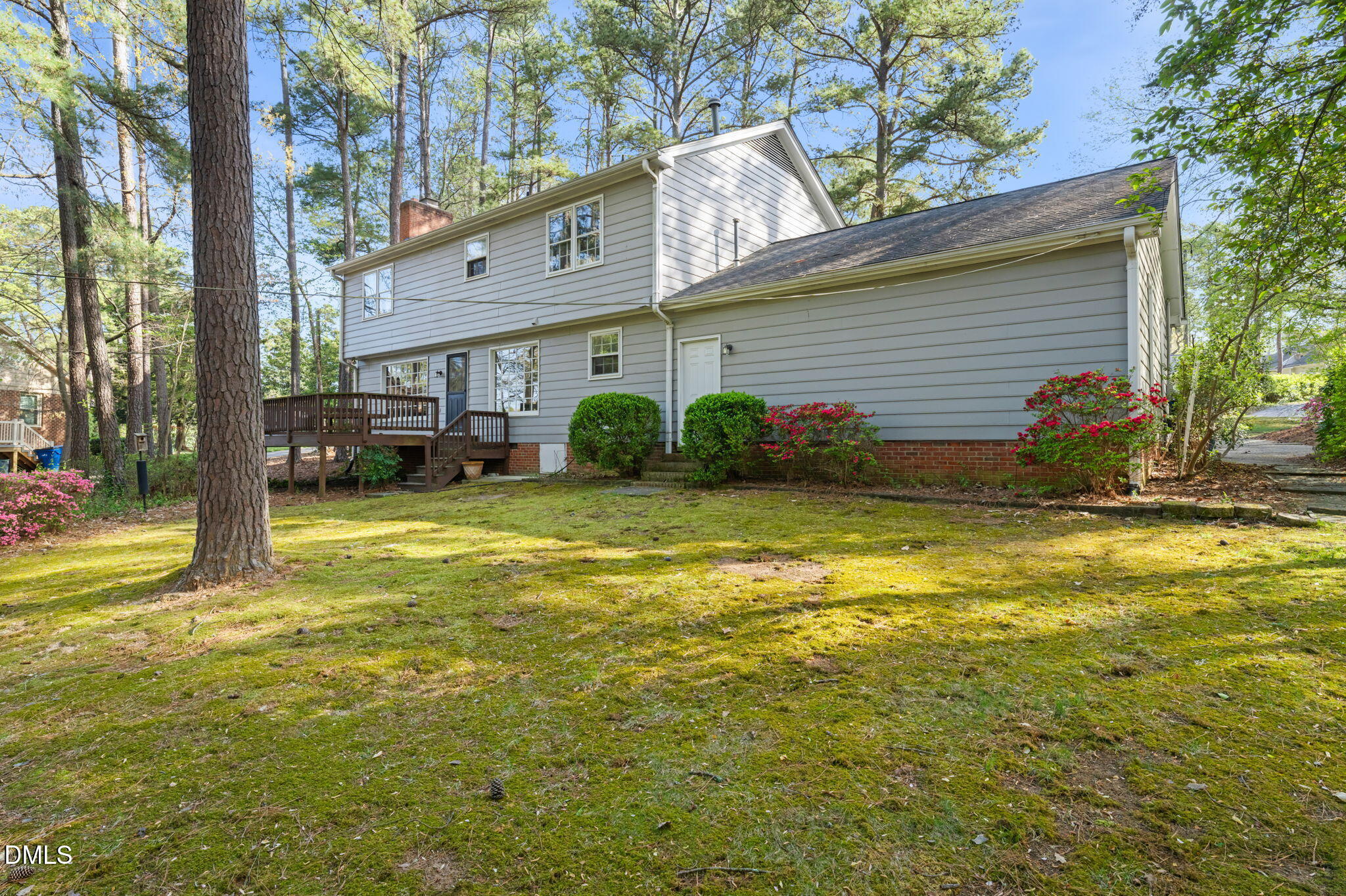 6115 Winthrop Drive Raleigh, NC 27612 - Photo 34 of 41 a view of a house with a yard