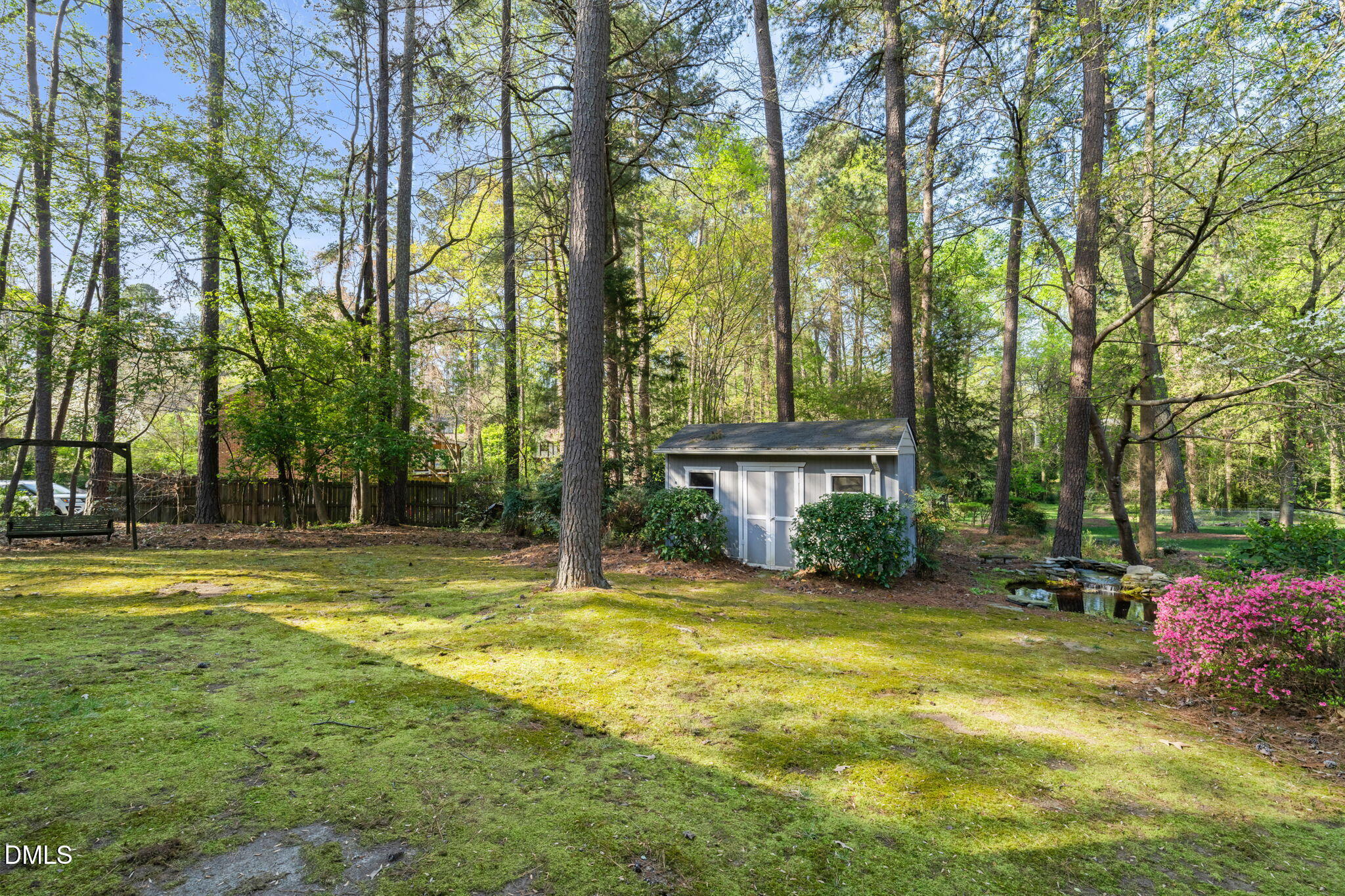 6115 Winthrop Drive Raleigh, NC 27612 - Photo 36 of 41 a view of a fountain in front of a house
